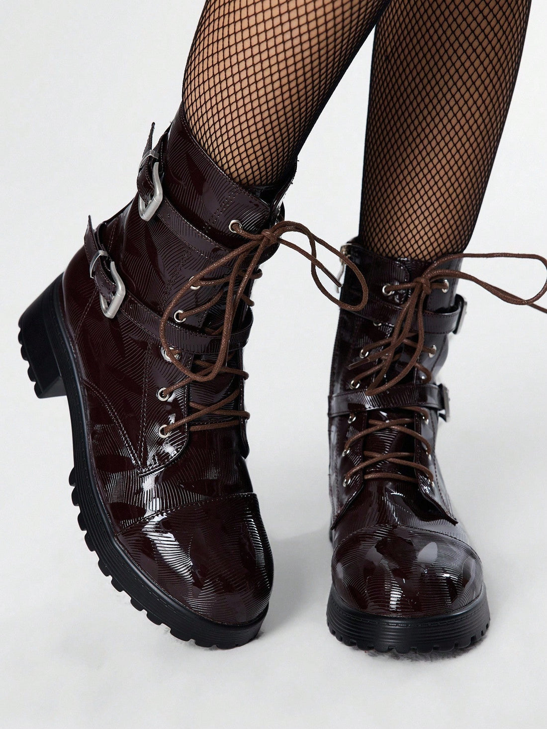 Step into bold style with these Vintage Grunge Punk Short Boots for Women. Featuring an elegant lace-up mid-calf design, sturdy buckle detail, and a convenient side zipper, they blend edgy charm with easy wear. Perfect for adding a rebellious twist to any outfit, these boots make your stride confident and effortlessly cool.