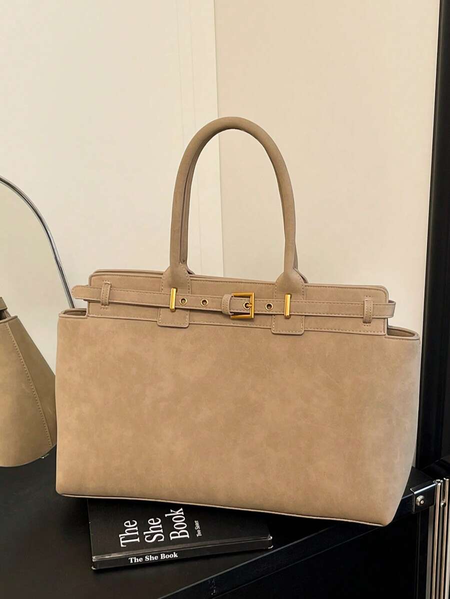 Carry your world in style with this spacious vintage-inspired tote that's equal parts sophisticated and fun. Crafted from durable faux leather, it features a roomy interior perfect for laptops, documents, and all your daily essentials—without the guilt. The timeless silhouette works seamlessly from boardroom to brunch, while the structured design keeps everything organized and accessible. Whether you're juggling work projects or weekend adventures, this tote proves that looking polished doesn't mean sacrifi