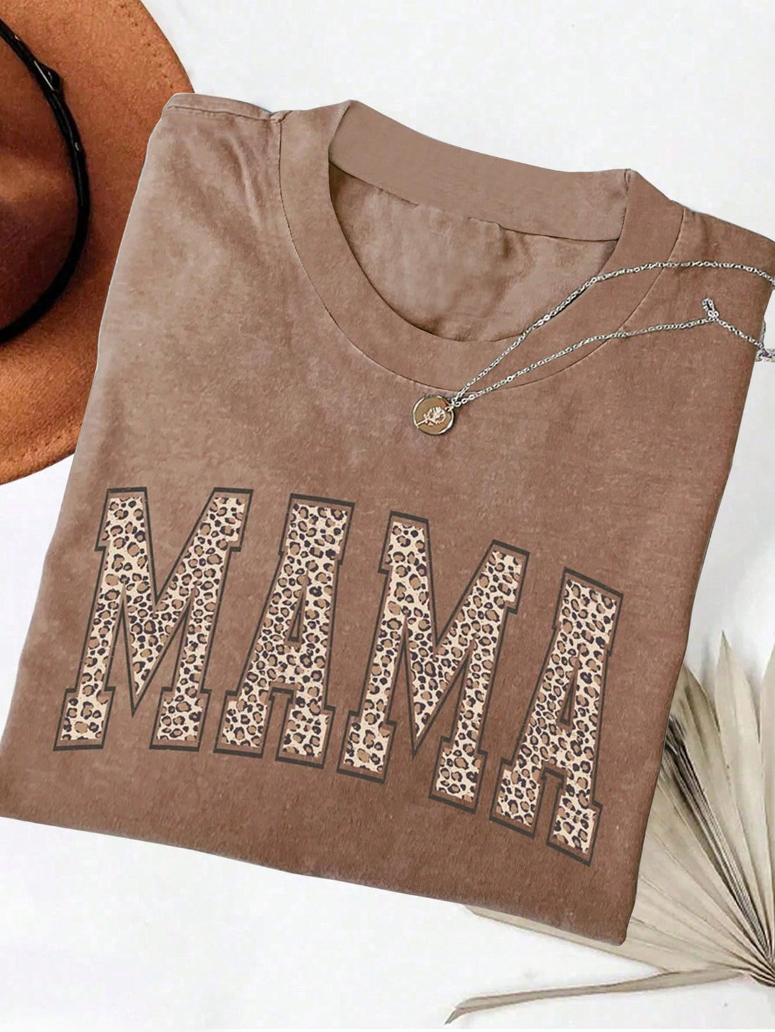 Show your mom some love with our Vintage Leopard Print Mom Shirt! This unique graphic tee makes the perfect Mother's Day gift, with a playful leopard print design that will make your mom stand out in style. Perfect for moms who love to make a statement while staying on-trend.
