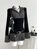 Front view of black rib-knit faux two-piece mini dress with pinstripe collar and flared hem