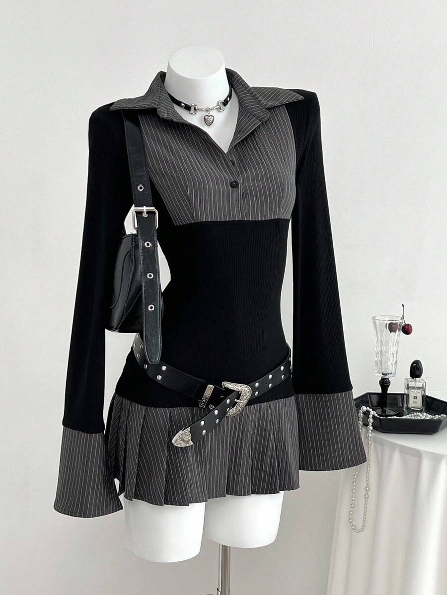 Front view of black rib-knit faux two-piece mini dress with pinstripe collar and flared hem
