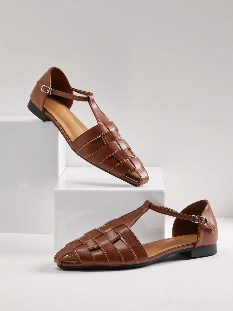 Step into timeless elegance with these vintage Roman-inspired woven flat clogs. Crafted with intricate woven detailing, these slip-ons combine comfort with classic style—perfect for everyday wear or as a thoughtful Valentine's Day gift. The flat sole provides all-day wearability, while the open design keeps your feet cool and comfortable. The woven texture adds visual interest and pairs effortlessly with casual dresses, jeans, or summer outfits. Ideal for women who appreciate retro aesthetics and practical 