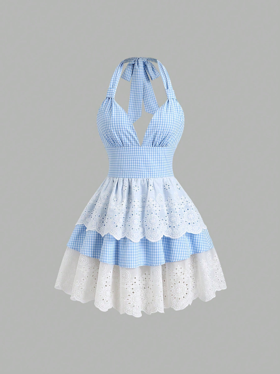 Step into summer fun with this Vintage Ruffled Mini Skirt featuring a charming blue plaid design. Its playful ruffles add a flirty touch, perfect for beach adventures or sunny strolls. Lightweight and breezy, it keeps you cool while turning heads with its retro vibe. Embrace carefree days in style!