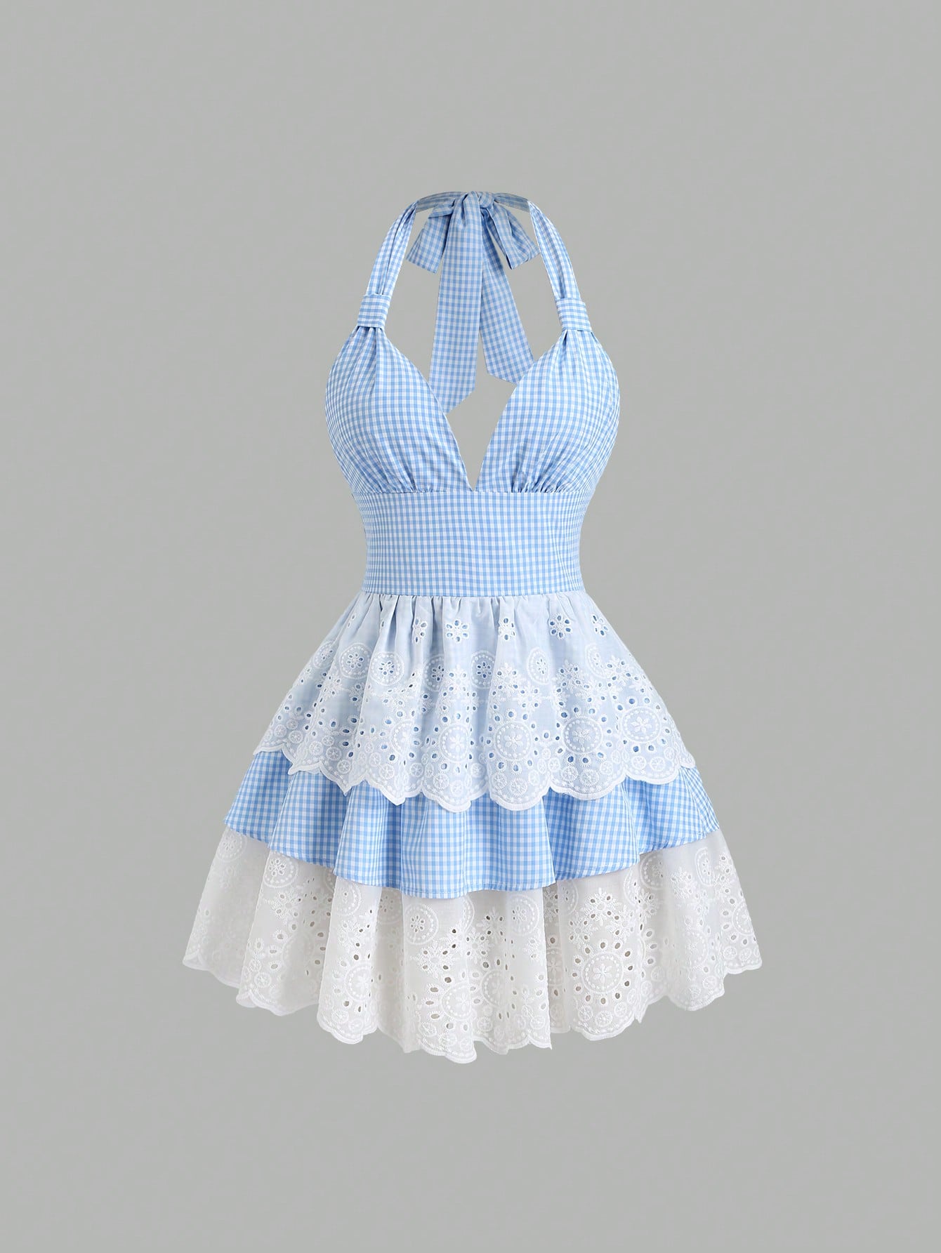 Step into summer fun with this Vintage Ruffled Mini Skirt featuring a charming blue plaid design. Its playful ruffles add a flirty touch, perfect for beach adventures or sunny strolls. Lightweight and breezy, it keeps you cool while turning heads with its retro vibe. Embrace carefree days in style!
