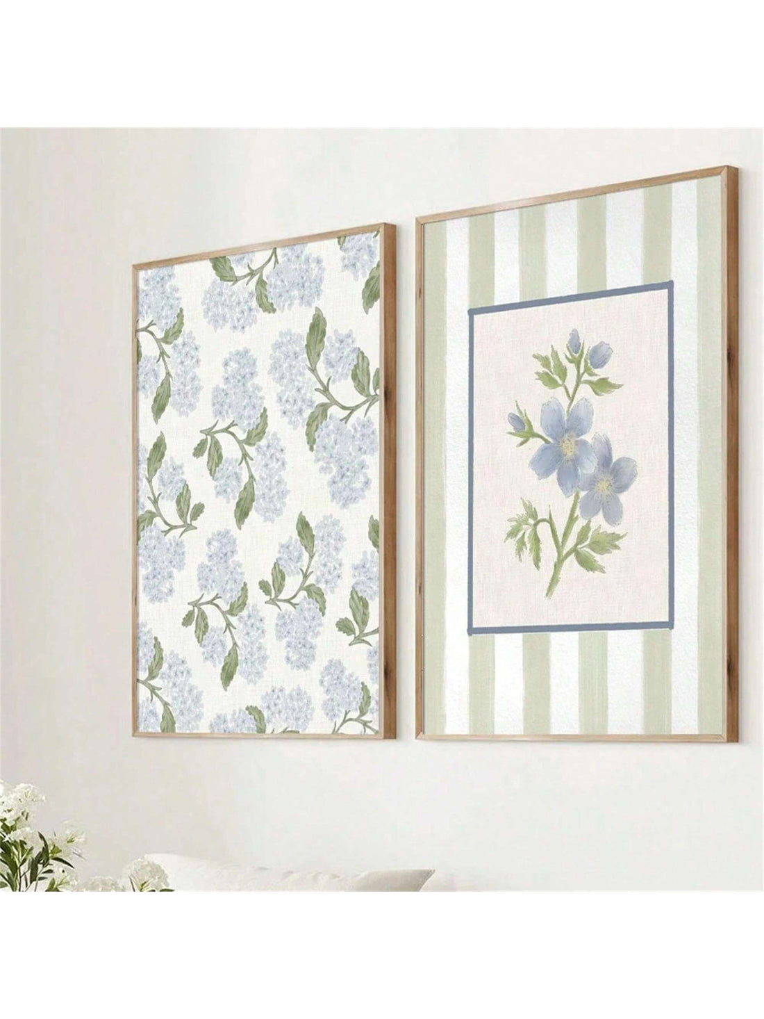 Add a splash of charm to your walls with this playful set of two vintage striped botanical prints. Featuring delicate blue florals, these unframed artworks bring a fresh, minimalist vibe perfect for modern living spaces. Easy to mix, match, and style, they brighten any room with a touch of timeless elegance and whimsy.
