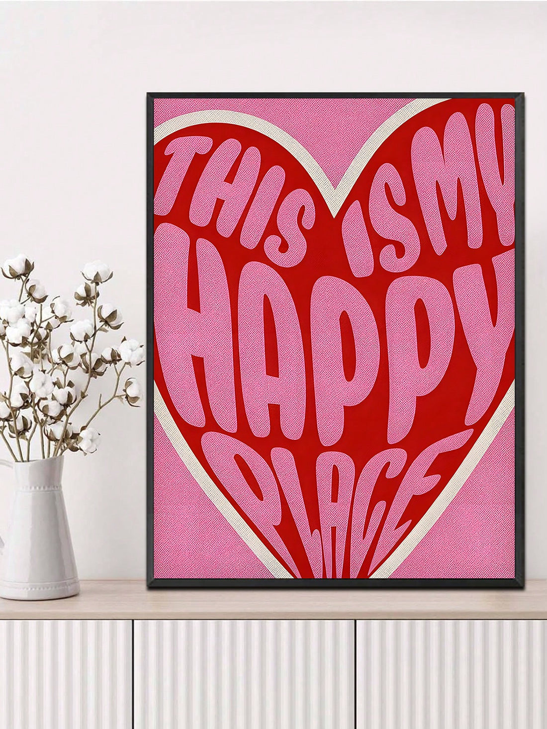 Transform any room into your personal sanctuary with this charming vintage-style wall art poster. Featuring the uplifting message "This Is My Happy Place," it's the perfect reminder to embrace joy in your everyday spaces. Whether displayed in your bedroom, living room, office, or creative studio, this inspirational canvas brings warmth and personality to your walls. The retro aesthetic pairs beautifully with modern, eclectic, or traditional décor styles. An ideal gift for friends, family, or anyone who dese