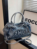Grab your style and essentials in one with the Vintage Washed Jeans Messenger Bag! This Y2K-inspired shoulder tote brings a cool, casual vibe to your work, travel, or school days. Its washed denim look gives off laid-back charm while roomy compartments keep your belongings organized and within easy reach. Perfect for those who love a blend of retro flair and everyday practicality. Ready to tote your world in style?