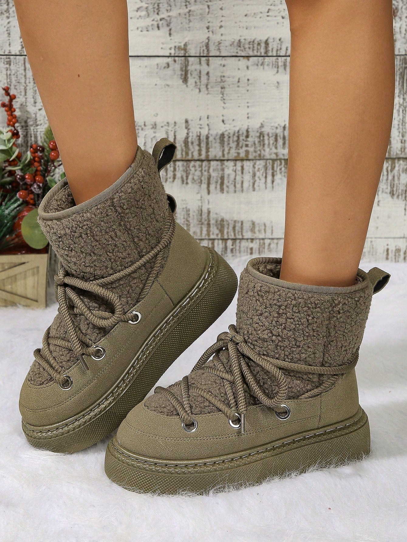 Stay stylish and cozy all winter long with our Warm Lace-Up Snow Boots. These boots are designed to keep your feet warm and secure with their lace-up feature, making them perfect for any snowy day. Don't sacrifice fashion for comfort, stay warm and trendy with our snow boots.