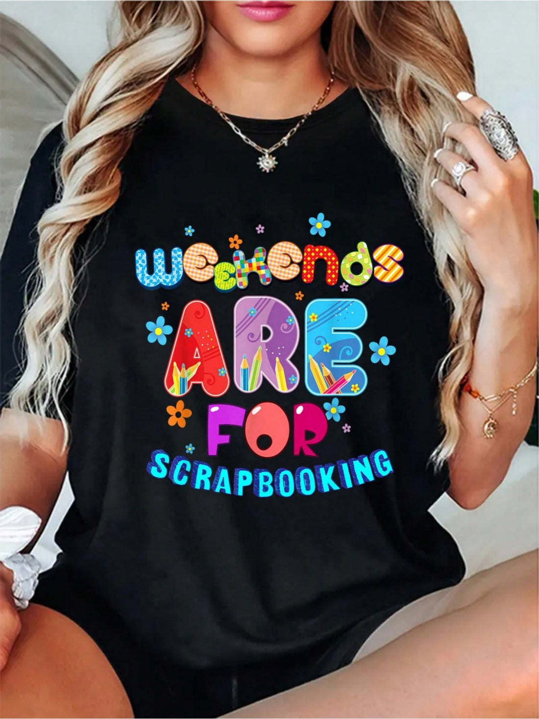 This Weekend Scrapbooking Vibes tee is perfect for creative souls who love to scrapbook on weekends. With a casual crew neck design, this tee is comfortable for all-day wear. Show off your love for scrapbooking in a fun and playful way!(Only ONE exclamation point used)