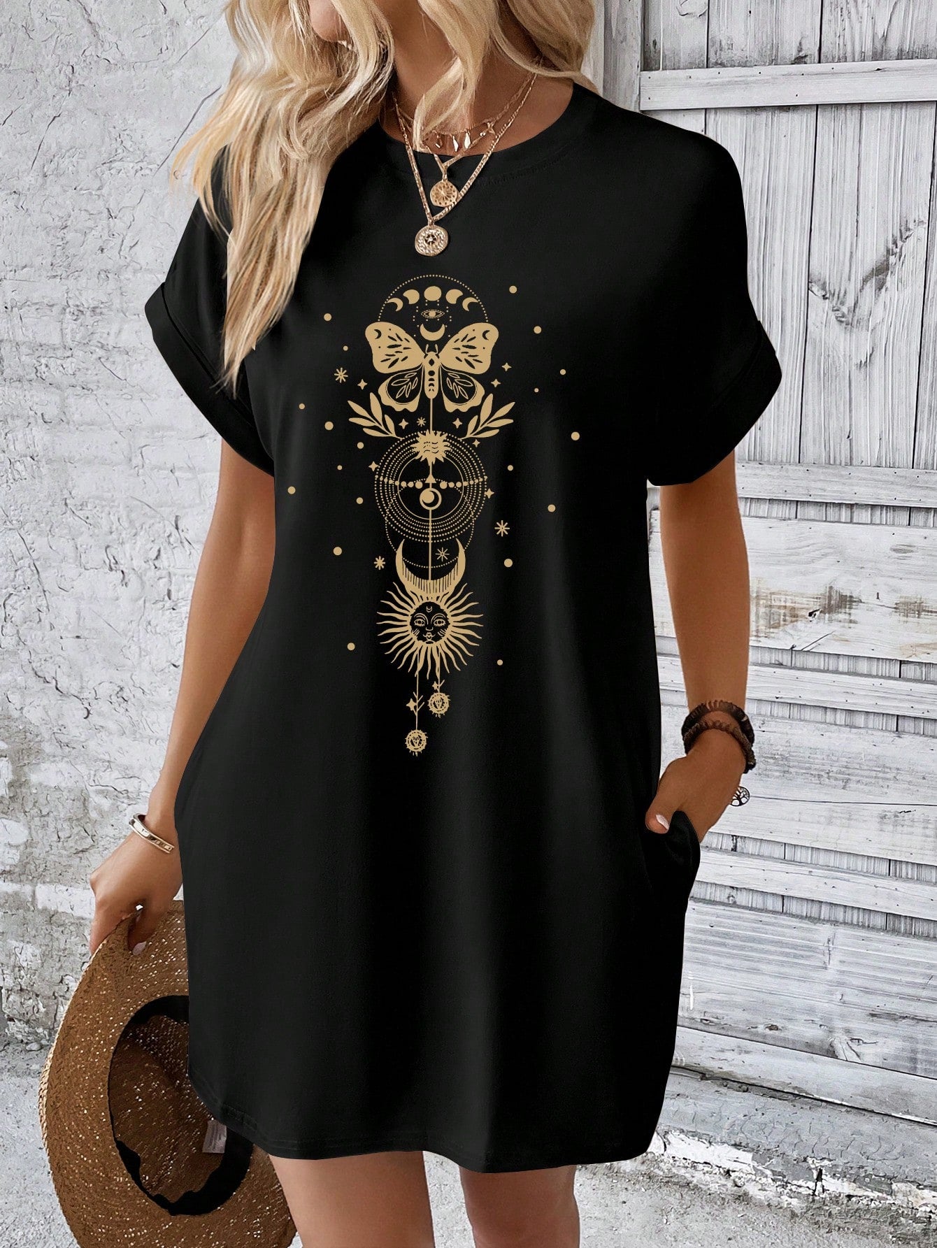 Unleash your inner butterfly with this whimsical tee dress. The batwing sleeves provide effortless style and the butterfly print adds a touch of whimsy. Perfect for those who want to look stylish without putting in much effort. Fly away in this playful and quirky dress!