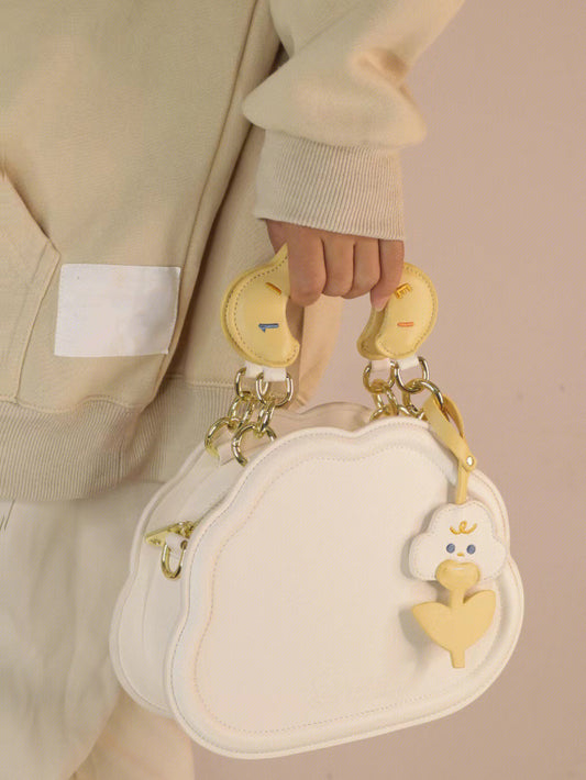 This Whimsical Cloud Charm PU Zipper Bag is a compact novelty accessory that adds a touch of charm to any outfit. The PU material provides durability and the zipper closure keeps belongings secure. Perfect for storing small items or as a keychain.