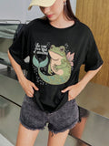 This playful and unique t-shirt features a whimsical design of a frog mermaid, perfect for women who love to add a touch of fun to their wardrobe. Made with high-quality materials, this shirt is both comfortable and stylish. Show off your love for whimsy with this one-of-a-kind graphic t-shirt.
