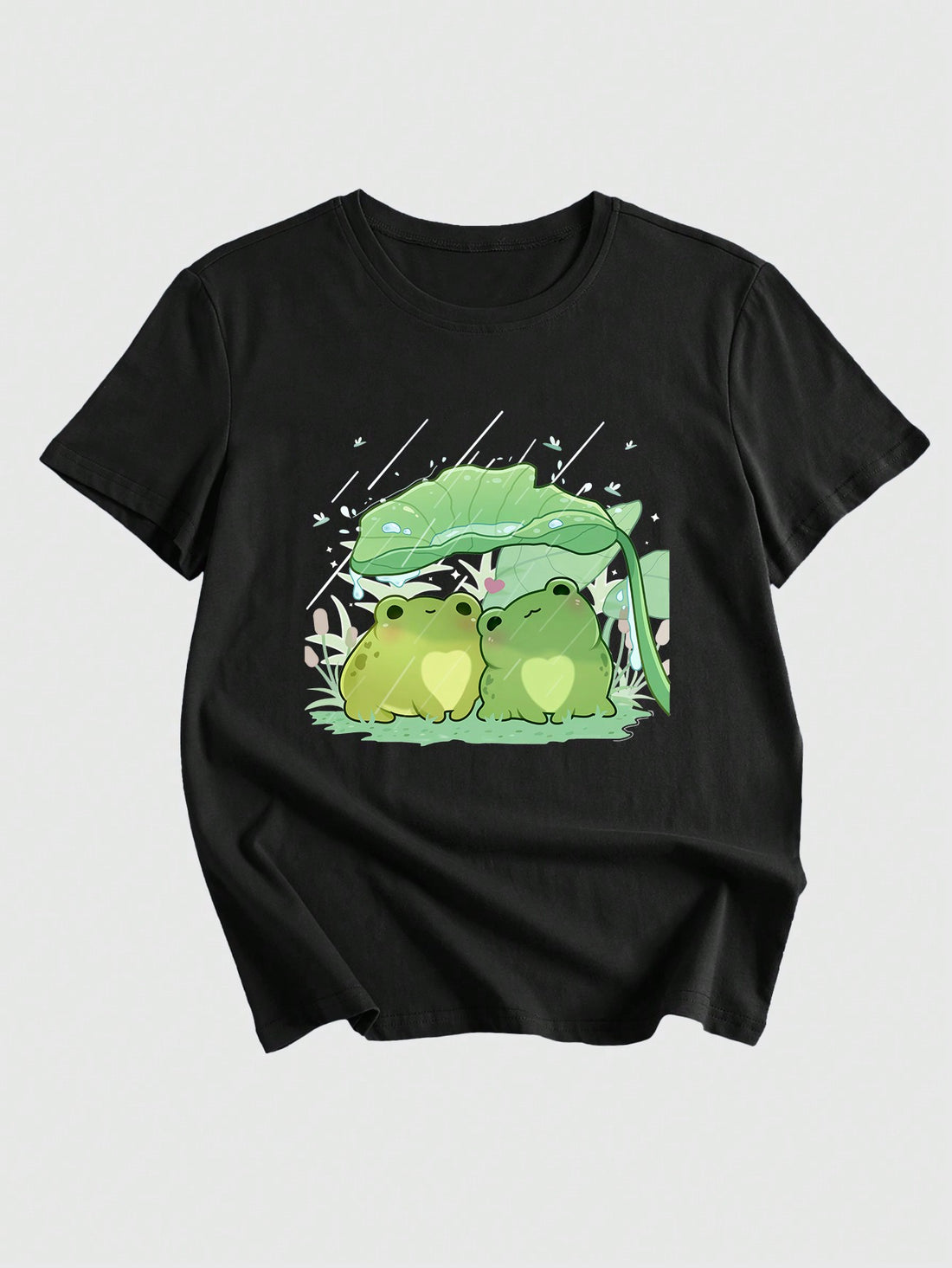 Introducing our Whimsical Kawaii Frog Print Tee, the perfect addition to any wardrobe. Made for both school and casual wear, this tee features a playful and cute frog print that is sure to make a statement. With its unique design and comfortable fit, you'll love wearing this tee all day long.
