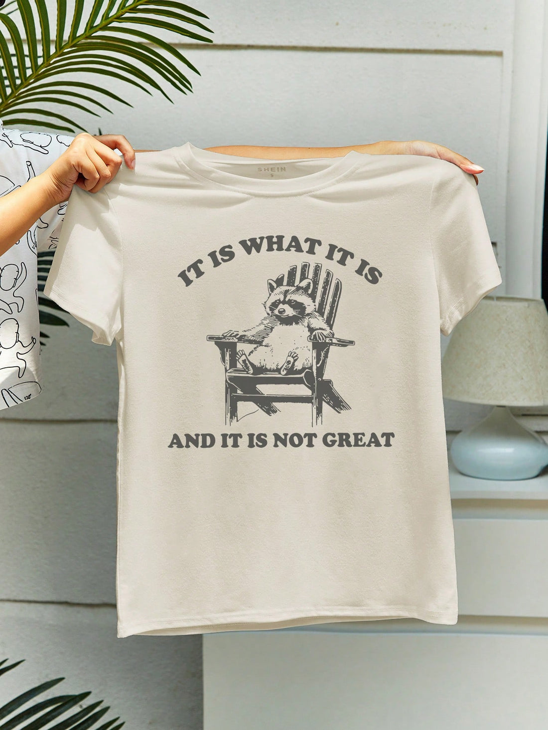 Elevate your summer style with our Whimsical Raccoon Print Casual T-Shirt. Made for effortless wear, this tee features a charming raccoon print that adds a touch of whimsy to any outfit. Crafted for comfort and style, you'll love how easy it is to dress up or down.