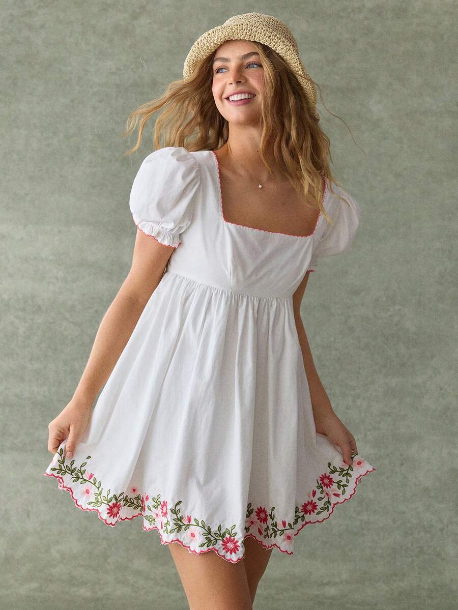 White floral embroidered babydoll mini dress with puff sleeves