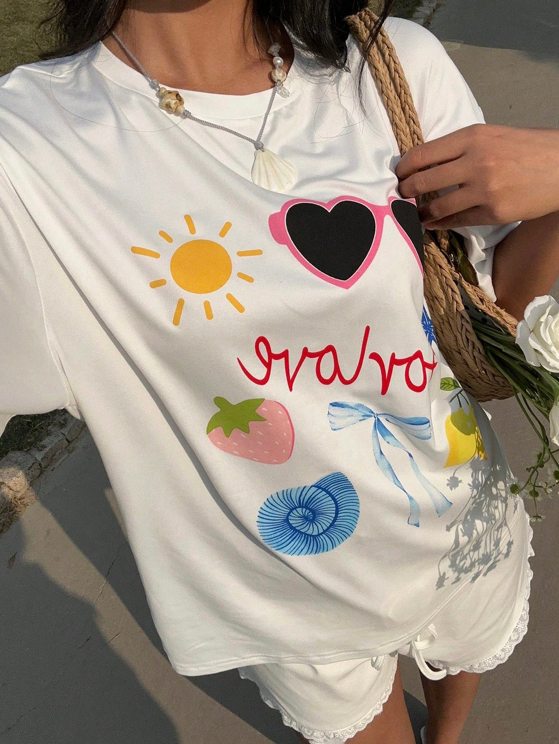 Get ready to rock an effortlessly cool look with our White Graphic Tee! Made with dropped shoulders and a quirky style, this tee brings a playful edge to any outfit. Perfect for those who don't take themselves too seriously, it's a must-have for adding some fun to your wardrobe!