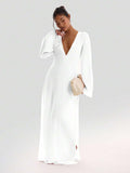 This white sheer maxi dress brings effortless summer vibes with its textured fabric and breezy wide sleeves. The side split adds a flirty touch, perfect for vacation days or sunny holiday strolls. Light, airy, and playful, it’s your go-to for stylish warm-weather adventures.