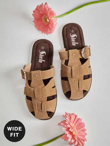 Enjoy effortless comfort and timeless style with these Wide Fit Fisherman Slide Sandals for Women. Designed with a roomy wide-fit silhouette and crafted in soft vegan suede, these sandals provide the perfect combination of everyday comfort and modern versatility. The classic fisherman-inspired design is updated with an adjustable buckle, giving you a secure, customized fit while maintaining a clean, minimalist look.