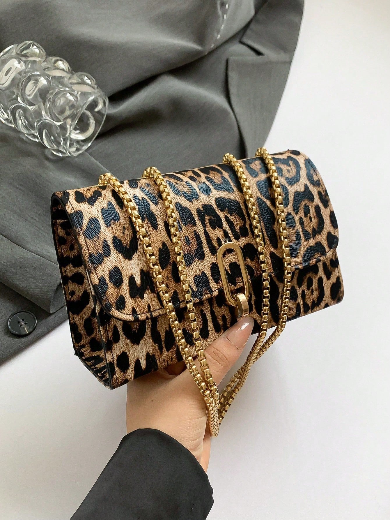 This Wild and Chic: Leopard Print Mini Square Shoulder Bag for Women is the perfect accessory for any fashion-forward individual. Its unique leopard print design adds an edgy touch to any outfit, while its mini square size makes it both stylish and practical