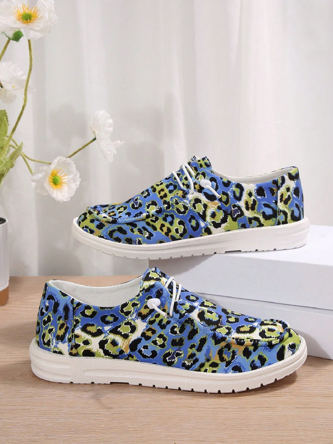 Introducing our Wild and Stylish Women's Leopard Print Lace-Up Sneakers, perfect for adding a fierce touch to your Halloween ensemble. With their trendy leopard print design and comfortable lace-up style, you'll be sure to turn heads and stay comfortable all night long. Get wild this Halloween with our stylish sneakers.