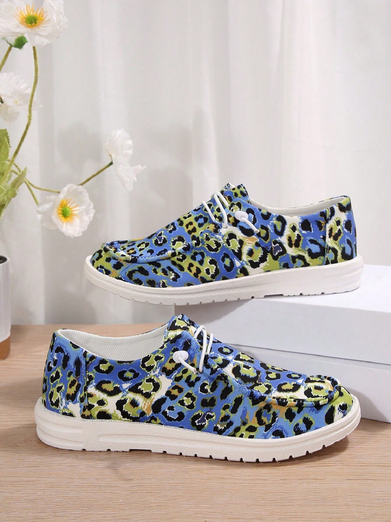 Introducing our Wild and Stylish Women's Leopard Print Lace-Up Sneakers, perfect for adding a fierce touch to your Halloween ensemble. With their trendy leopard print design and comfortable lace-up style, you'll be sure to turn heads and stay comfortable all night long. Get wild this Halloween with our stylish sneakers.