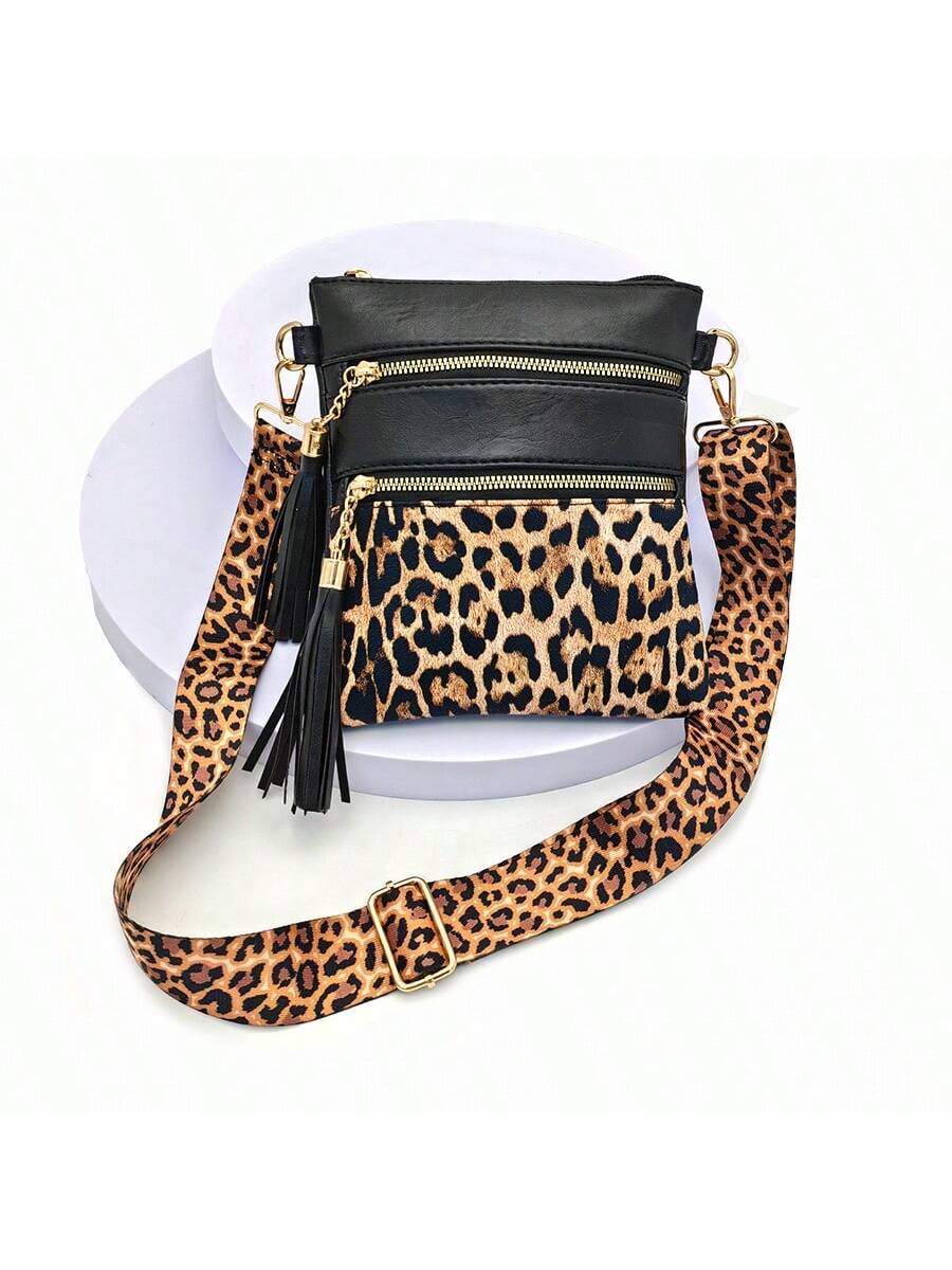 Experience fierce fashion with our Wildly Chic Leopard Print Tassel Crossbody Bag - your go-to statement piece for any outing! Featuring a stylish leopard print and playful tassel, this bag adds the perfect touch of wild to any outfit. Stay on-trend with this must-have accessory.