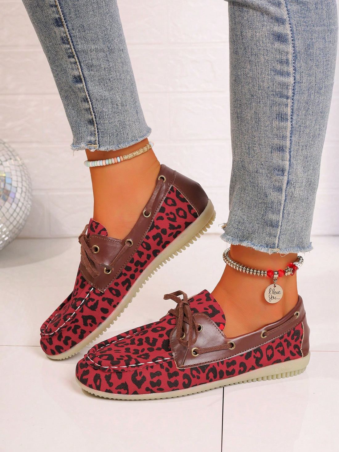 Discover a new level of comfort with our Wildly Comfortable Leopard Print Lace-Up Jelly Casual Flats for Women. The combination of stylish leopard print and adjustable lace-up design provide the perfect balance of fashion and function. Made with high-quality materials, these flats are sure to become your new go-to for everyday wear.