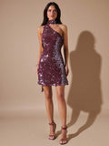 Make a statement in this wine red sequin mini dress, designed for unforgettable nights out. The asymmetric cut and daring backless silhouette create an alluring, modern look, while luxurious satin and shimmering sequins catch the light with every move. Perfect for cocktail parties, celebrations, and special occasions where you want to turn heads. The elegant draping flatters your figure and exudes confidence and sophistication.