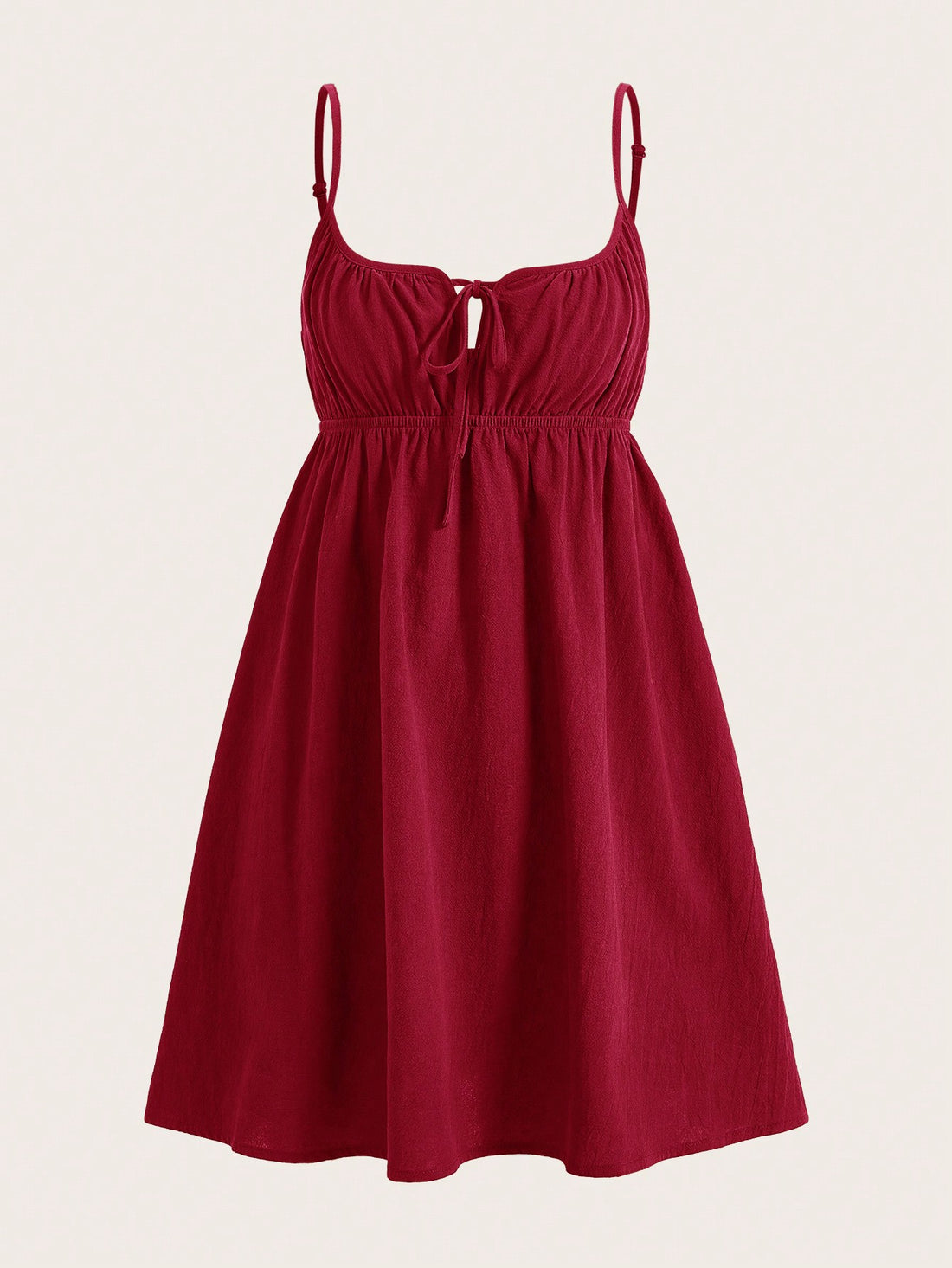 Turn heads with this playful Wine Red Woven Front Tie Casual Slip Dress. Its vibrant hue and charming front tie detail add a flirty touch, while the lightweight woven fabric keeps you comfy all day. Perfect for effortless style whether you're out with friends or enjoying a sunny day.