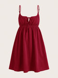 Turn heads with this playful Wine Red Woven Front Tie Casual Slip Dress. Its vibrant hue and charming front tie detail add a flirty touch, while the lightweight woven fabric keeps you comfy all day. Perfect for effortless style whether you're out with friends or enjoying a sunny day.