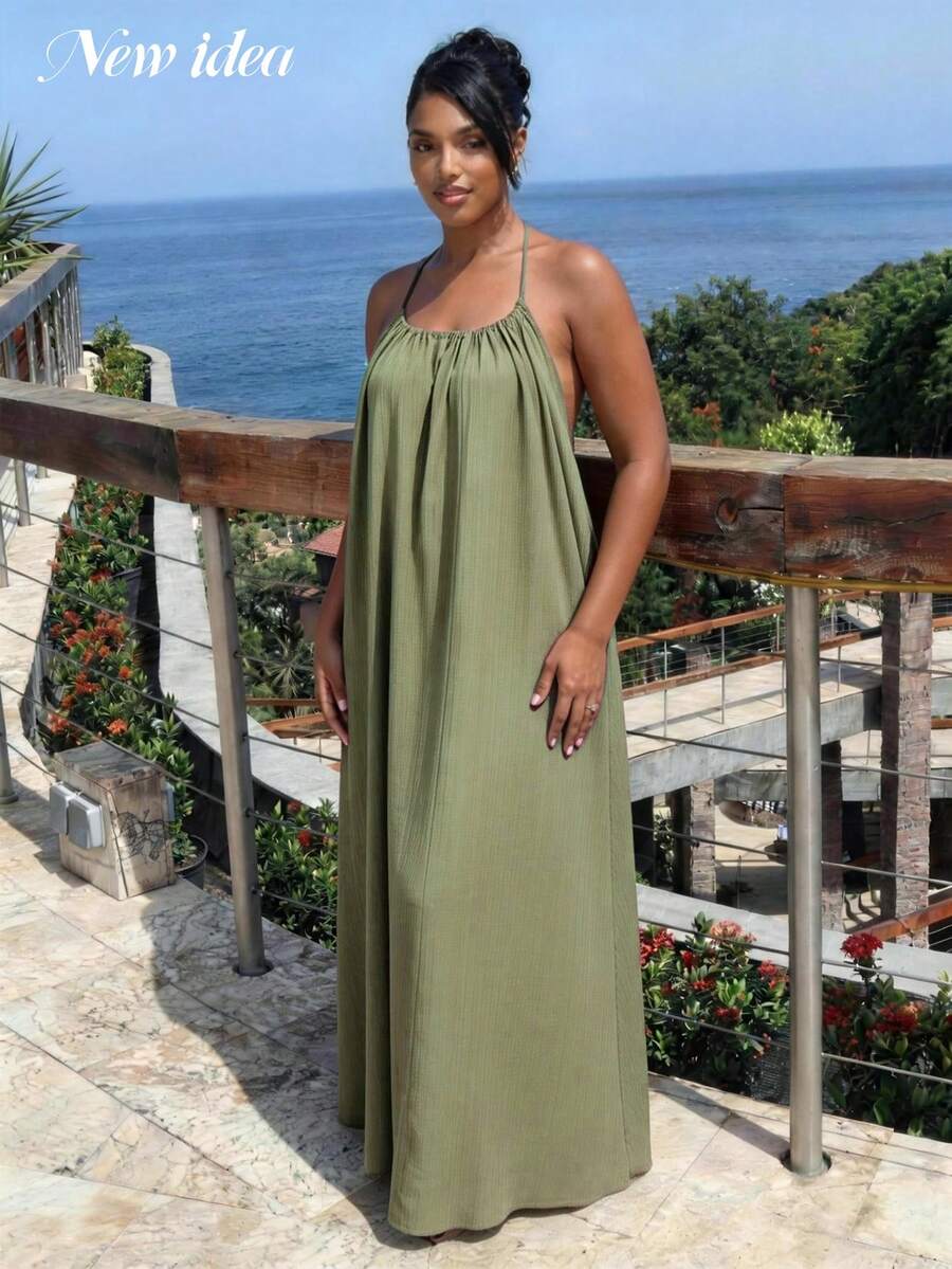 Effortless elegance meets everyday comfort in this women's casual green halter maxi dress. The thin halter straps provide a flattering neckline while the flowy, loose-fit silhouette drapes beautifully for all-day wear. Perfect for warm weather outings, casual gatherings, or relaxed weekend adventures. The maxi length offers modest coverage with a breezy, relaxed vibe that transitions seamlessly from day to night. A versatile wardrobe essential that combines style with comfort.