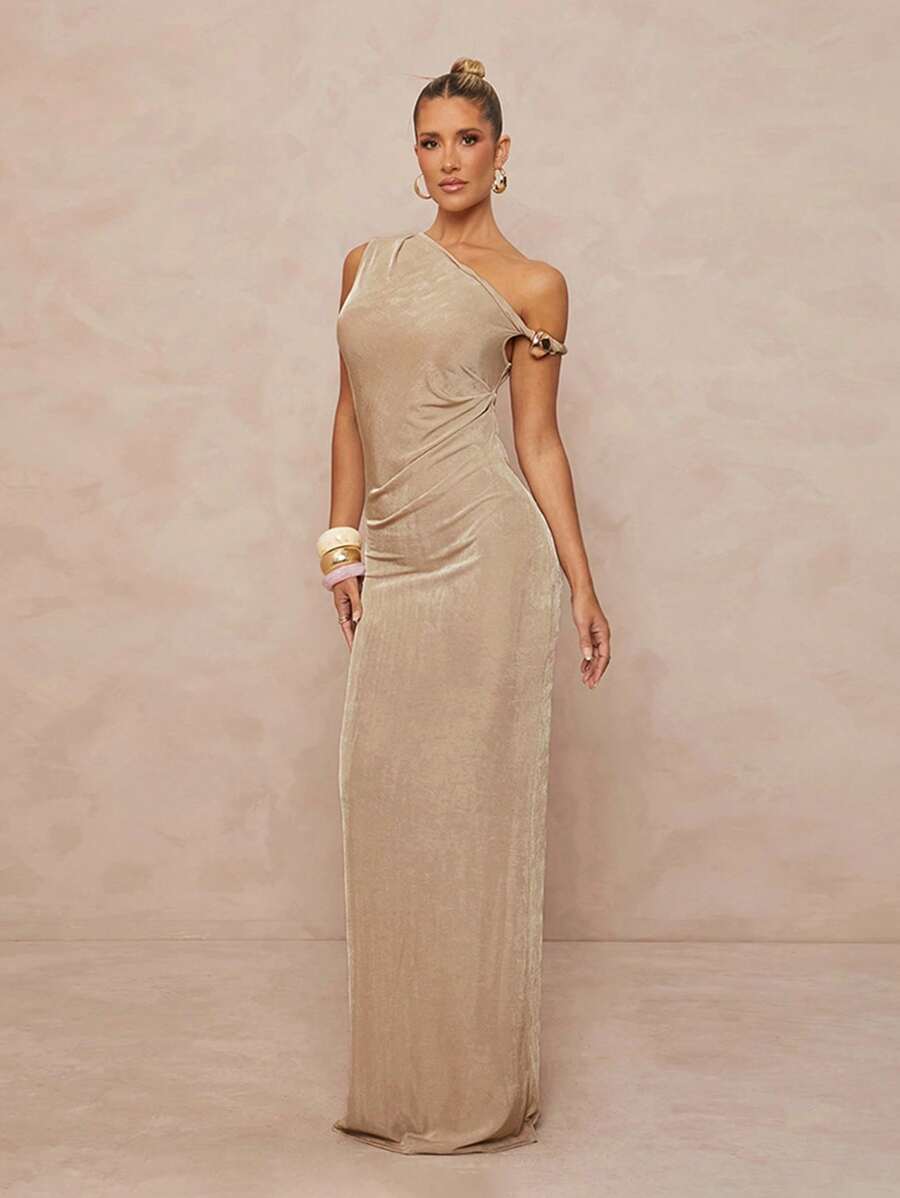 Turn heads in this playful women's bodycon dress featuring an eye-catching asymmetrical shoulder cut that adds a daring twist to your look. Metallic accents bring a touch of edgy shine, while the pleated design creates flattering movement and texture. Perfect for nights out or special occasions, this dress blends bold style with a flattering fit that celebrates your confident spirit.