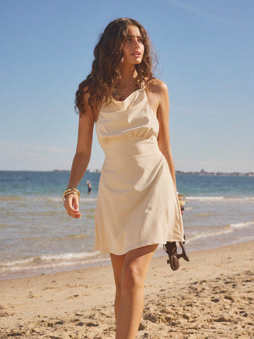 Step into sunshine and fun with this backless solid color mini dress, perfect for summer beach days and vacation celebrations. Its breezy, playful design keeps you cool while turning heads, letting you dance freely from shore to party. Embrace the carefree vibe and make every moment a stylish memory.