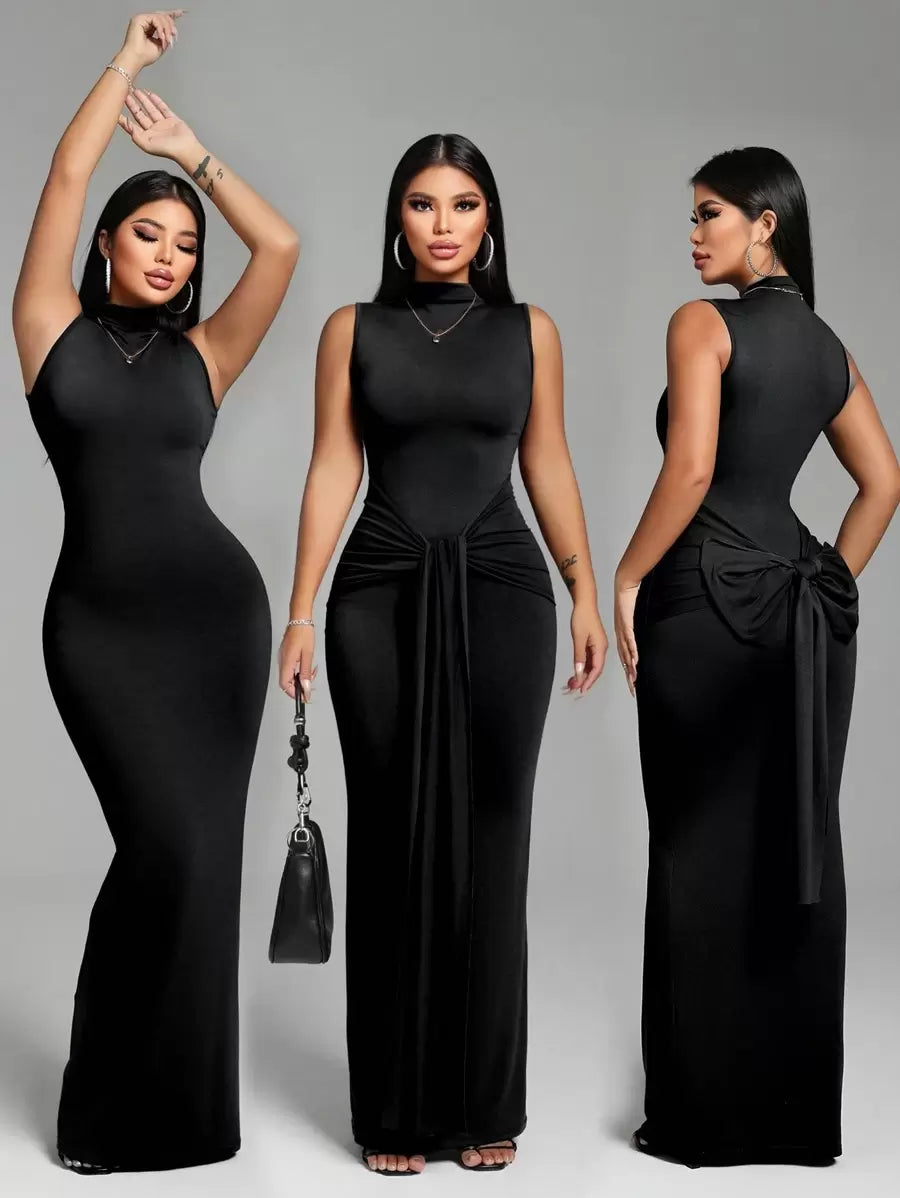 Turn heads with this chic backless slip dress that's equal parts sultry and sophisticated. The fitted silhouette hugs your curves in all the right ways, while the tie-up back detail adds an unexpected flirty touch. Crafted in a timeless solid color, it's the perfect canvas for bold accessories and confident vibes. Whether you're heading to a night out or a special occasion, this dress delivers effortless elegance with a playful edge. Slip it on and let your style do the talking.