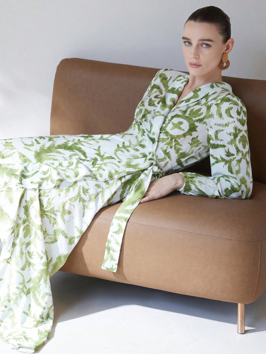 Step into a lush escape with the Women's Bamboo Knot Dress in Rainforest Mystery Green Plant Print. Crafted from soft bamboo fabric, this dress feels like a gentle breeze while showcasing vibrant tropical leaves. The stylish knot detail adds a fun twist that flatters every figure, making it perfect for both sunny strolls and moonlit adventures. Embrace nature's charm and effortless comfort all in one playful piece.