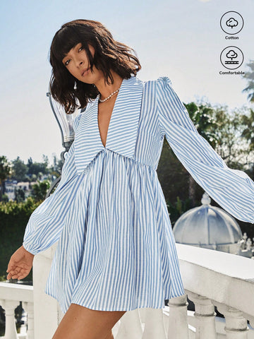 Step into sunshine with this playful blue and white striped mini dress, featuring charming lantern sleeves that add a flirty touch. Lightweight and breezy, it’s your go-to for casual days or holiday adventures, keeping you cool and stylish wherever you wander.
