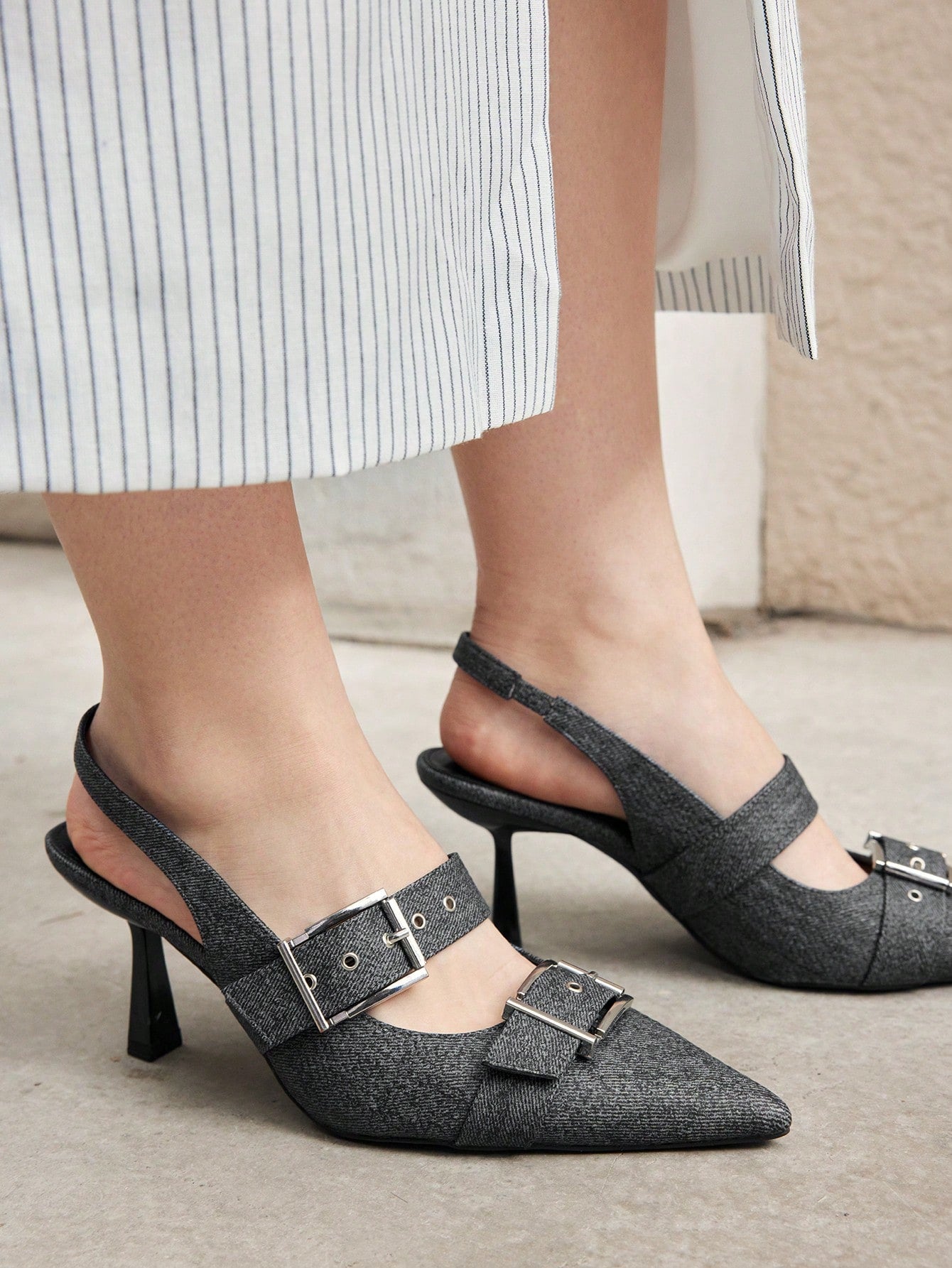 Elevate your summer style with our Women's Buckle Detail High Heels. Perfect for vacation, these heels add a touch of elegance and sophistication to any outfit. With adjustable buckle details and a sturdy heel, you'll feel confident and fashionable all day. Don't miss out on our summer sale!