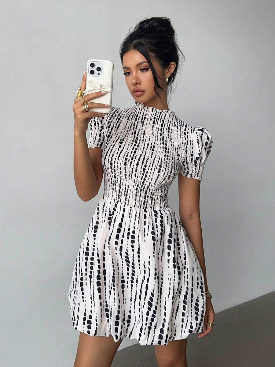 Embrace whimsical charm with this Women's Butterfly Print A-Line Dress, featuring a stand collar and adjustable drawstring waist for a perfect fit. The fluttery butterfly print adds a touch of playful elegance, while the A-line silhouette flatters every shape. Whether you're headed to brunch or a garden party, this dress keeps you comfortably stylish and ready to twirl.