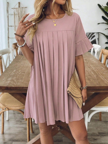 Step out in style with this playful women's casual pleated dress. Featuring a chic solid color and a comfy round neck, it effortlessly blends elegance with everyday ease. The flowing pleats add a fun, flirty touch, making it perfect for brunch dates or casual outings where you want to shine without trying too hard.