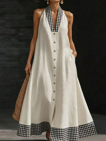Cream halter maxi dress front view with gingham trim buttons and pocket