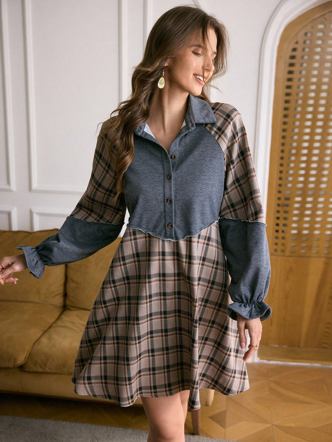 Mixing patterns like a pro? This color block plaid shift dress is your new fall obsession. The relaxed silhouette keeps things comfy while the long sleeves and bold plaid combo give you that effortlessly chic vibe. Perfect for layering over your favorite tee or styling solo—it's the kind of piece that works whether you're grabbing coffee or heading to brunch. Easy, breezy, and totally on-trend.