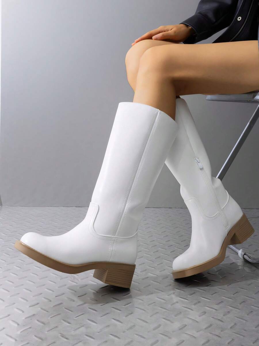 Step into style and comfort with these women's knee-high boots, designed for those who refuse to compromise on either. The sturdy square toe and chunky block heel provide all-day wearability, whether you're running errands or channeling your inner cowgirl. Perfect for casual riding or everyday adventures, these boots deliver the confidence boost you deserve. Slip them on and feel the difference quality craftsmanship makes!