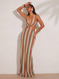 Full front view of multicolor halter cutout bodycon maxi dress with mermaid hem