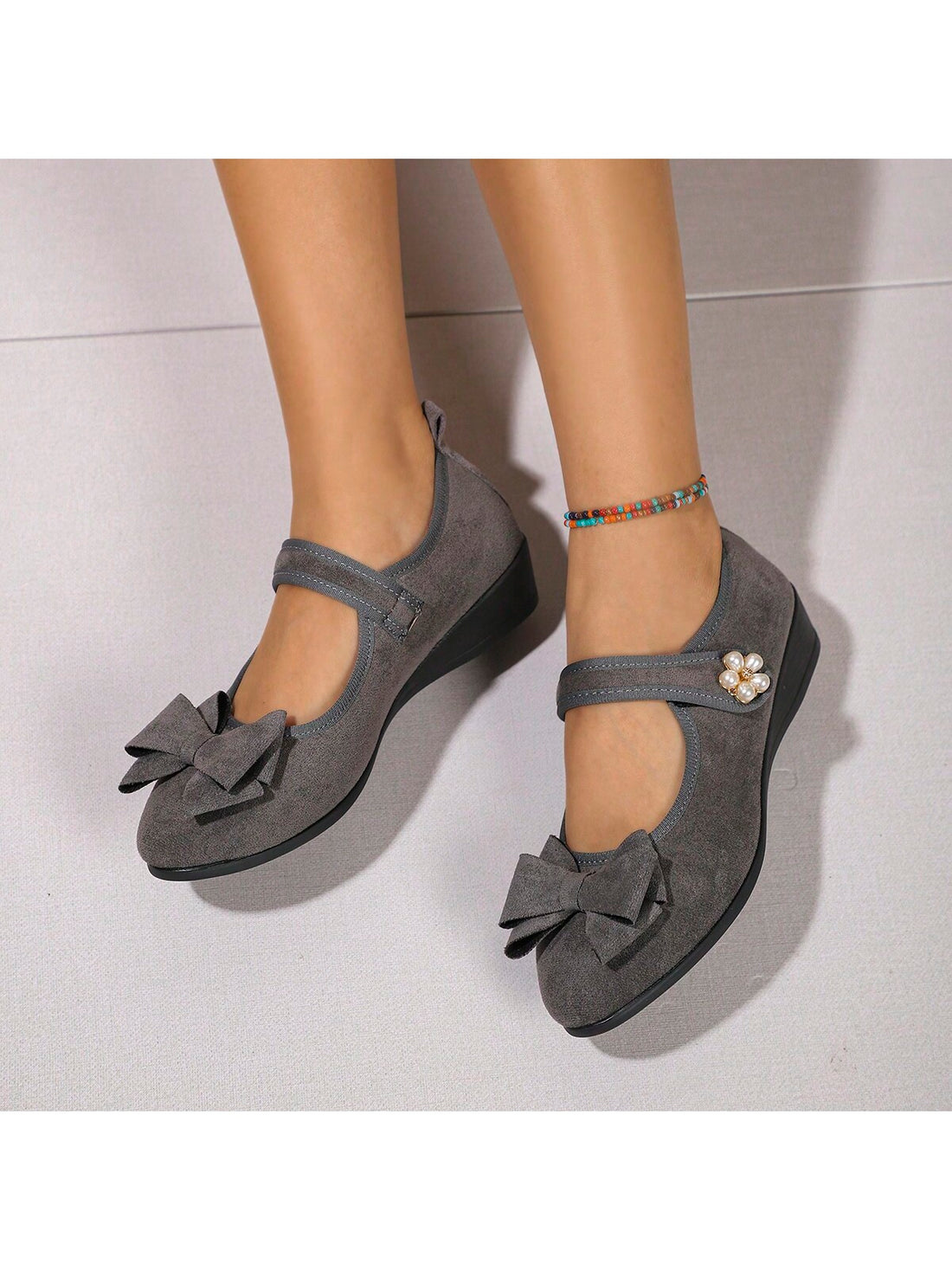 Step into style with our Women's Elegant Bow-Decor Thick Platform Wedge Heel Slip-On Loafers. These trendy shoes feature a chic bow decoration and a thick platform wedge heel, adding both elegance and height to your look. Slip them on for a comfortable yet fashionable statement.