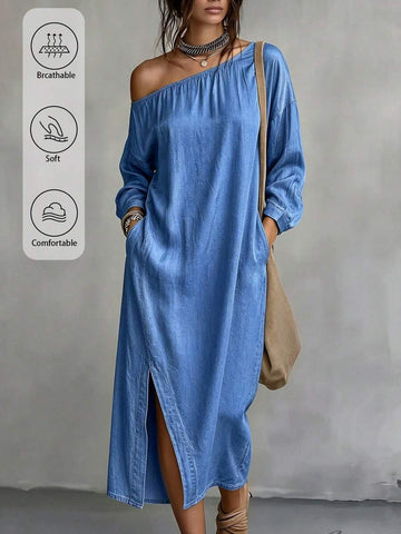 Front detail view of cornflower blue denim dress with pockets and wide neckline
