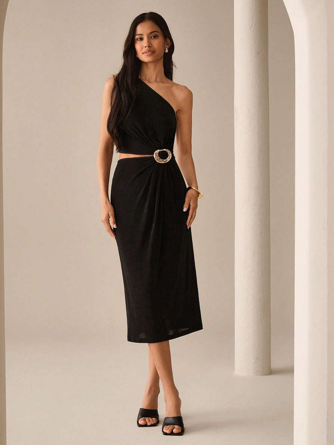Step out in style with this playful off-shoulder dress that blends minimalist elegance with a touch of urban charm. Its mid-length cut flatters your silhouette while the subtle metal decor adds just the right amount of sparkle for romantic city nights. Perfect for parties where you want to shine effortlessly and dance the night away.