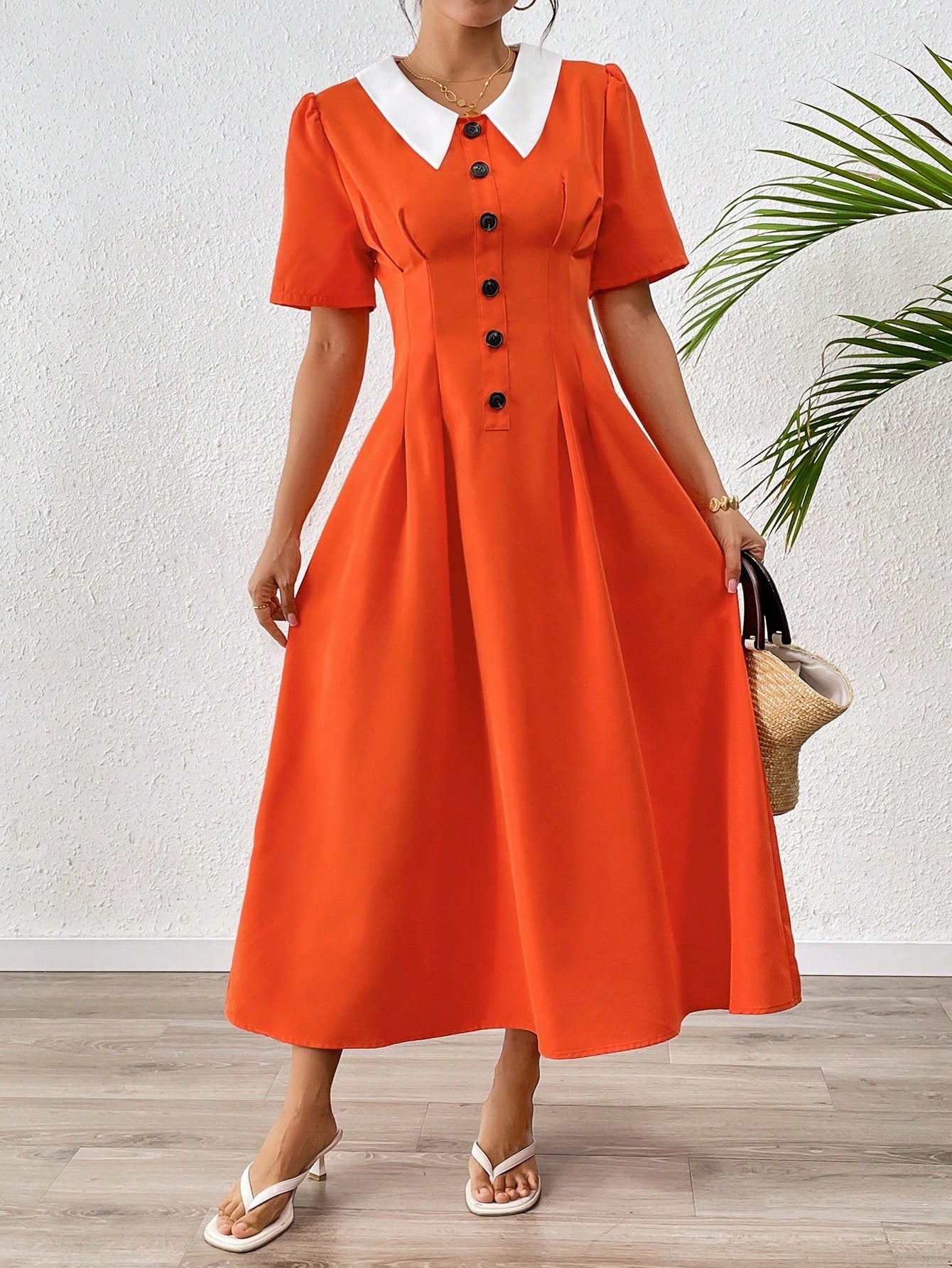 Step into spring and summer with this playful yet elegant dress designed just for you. Featuring a charming shirt collar and a ruched waist, it effortlessly flatters your silhouette while keeping things light and breezy. Perfect for casual outings or sunny day adventures, this dress combines comfort with a touch of sophistication, making every moment feel special and stylish.