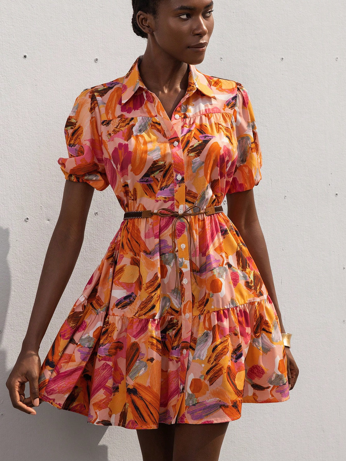 This playful short dress boasts a one-of-a-kind print that turns heads wherever you go! Slip into instant elegance with its flattering silhouette, perfect for beach strolls or sunset cocktails. Pack this versatile vacation essential and be ready for any adventure – from sightseeing to impromptu dinner dates!