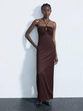Step into summer with this chic halter neck dress designed for effortless style and comfort. Its solid color and elegant cut highlight your silhouette while keeping things cool and breezy. Perfect for sunny days or evening outings, this dress adds a playful charm to your wardrobe with minimal effort. Get ready to twirl and shine all season long!