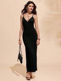 Effortlessly stylish! This Women's Elegant Solid Color Slim Fit Maxi Camisole Dress is the perfect addition to your wardrobe. The slim fit design will flatter your figure while the solid color adds a touch of elegance. Be prepared to turn heads and make a statement.